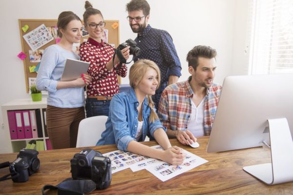 coworkers-office-with-photo-cameras-computer